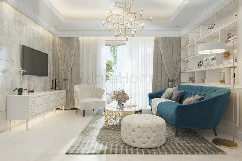 Bộ sofa cao cấp bọc nỉ màu xanh ấn tượng được coi là điểm nhấn sang trọng, tạo sự tươi mới cho không gian phòng khách của gia chủ Mẫu thiết kế nội thất chung cư đẹp